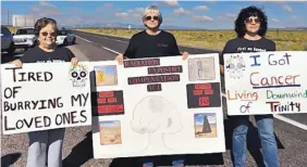  ?? COURTESY OF TINA CORDOVA ?? Members of the Tularosa Basin Downwinder­s Consortium and their supporters conduct peaceful protests outside the gates to the Trinity Site to educate visitors of the devastatin­g affects the atomic bomb blast has had on residents near the site.