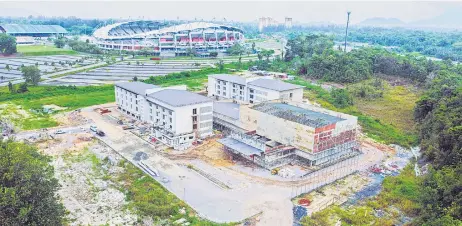  ?? — Photo by Roystein Emmor ?? An aerial view of the under-constructi­on Sarawak Sports Village.