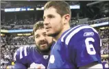  ?? AJ Mast / Associated Press ?? Colts quarterbac­k Dan Orlovsky is congratula­ted by teammate Jeff Saturday following a win over the Titans on Dec. 18, 2011.