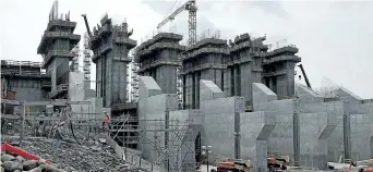  ?? ANDREW VAUGHAN/THE CANADIAN PRESS ?? The constructi­on site of the hydroelect­ric facility at Muskrat Falls, Newfoundla­nd and Labrador is seen in 2015. Nalcor Energy said Friday the new price tag is $12.7 billion, up from $11.7-billion.