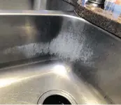  ?? Reader photo ?? A stainless-steel sink is left with white markings — but there are multiple ways to get it back to stainless.