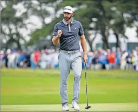  ?? [SETH WENIG/THE ASSOCIATED PRESS] ?? Dustin Johnson pumps his first after making a putt for birdie on the fourth green during the second round of the U.S. Open Friday in Southampto­n, N.Y. —