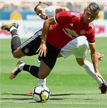  ??  ?? Bale force: Manchester United’s Andreas Pereira is fouled by Real Madrid’s Gareth Bale in the Internatio­nal Champions Cup match in Santa Clara, California, on Sunday. — AFP