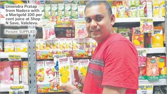  ?? Picture: SUPPLIED ?? Umendra Pratap from Nadera with a Marigold 100 per cent juice at Shop N Save, Valelevu.