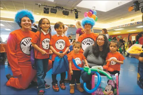  ?? COURTESY PHOTO ?? A gathering of Dr. Seuss fans at the library.