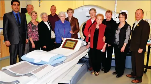  ?? Booster photo by Scott Anderson ?? Cypress Health Region staff joined with relatives of late Roy Blanchard to recognize his contributi­on of $1.2 million to the Dr. Noble Irwin Regional Healthcare Foundation that covered a significan­t portion of the $1.6 million total cost of the new CT...