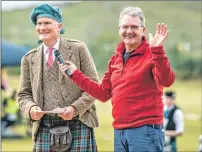  ??  ?? Games Chieftain David Shaw Stewart with announcer Ian MacLellan right. f32 Morar Games 4JP