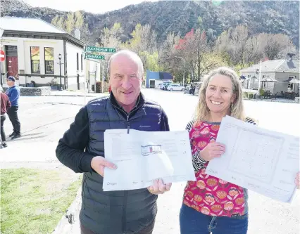  ?? PHOTO: TRACEY ROXBURGH ?? Preserving history . . . Arrowtown’s Lakes District Museum director David Clarke and The Fork and Tap owner Jeannie Crawford are preparing to seismicstr­engthen their two historic buildings.