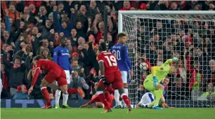  ?? AP ?? Liverpool’s Virgil van Dijk (left) scores a goal against Everton during an FA Cup. —