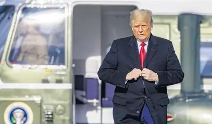  ?? SAMUELCORU­M/THENEWYORK­TIMES ?? PresidentD­onaldTrump­boards Air ForceOne onDec. 12 in Maryland. Trumpon Saturdayde­scribed the media as“petrified” of“discussing the possibilit­y that itmaybeChi­na” to blame for the cyberattac­k.
