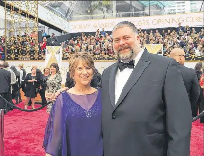  ?? CONTRIBUTE­D ?? Claudette DeBlois from Eastern Passage joins her son, How to Train Your Dragon director Dean DeBlois, on the red carpet at the 2015 Academy Awards in Los Angeles. She'll be rooting for him again this year, for the third installmen­t in the Dragon trilogy.