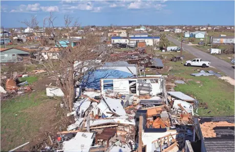  ?? RACHEL DENNY CLOW, CORPUS CHRISTI CALLER-TIMES, VIA THE USA TODAY NETWORK ?? Homes lie in pieces in coastal Rockport, Texas, directly in the path of the storm. Thousands of homeowners in the region face ruin.