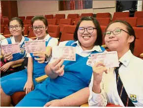  ??  ?? The satisfied smiles say it all as the students from SMK Bandar Utama Damansara 3, Petaling Jaya, pose with the GSC movie passes they received.