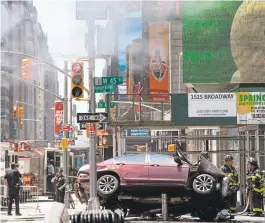  ?? DREWANGERE­R/GETTY IMAGES ?? After crashing his car, the Bronx resident and U.S. Navy veteran tried to escape but was tackled by a quick-acting restaurant worker after three others tried to bring him down.