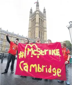  ?? Picture: PA. ?? Supporters and staff from McDonald’s in Cambridge during a rally at Old Palace Yard, London, yesterday.