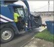  ?? THE MORNING JOURNAL FILE ?? Republic Services Residentia­l Swing Driver Tom Coultrip uses an automated collection truck in Lorain in 2019.