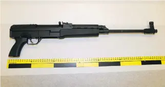  ??  ?? The Ottawa Police Service guns and gangs unit participat­ed in a probe led by the Gatineau Police anti-gang unit, which resulted in Thursday morning raids on both sides of the Ottawa River. Five people face charges. An assault rifle, cash, crack...