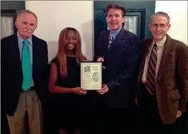  ??  ?? Above: Kaiya Moore becomes the 2016 Pearl and Floyd Franks Scholarshi­p Designee for the Share America Foundation, Inc. From left are Share America Chairman Gary Knowles, Moore, President Randall Franks and Vice Chairman Jimmy Terrell. Right: Kaiya...