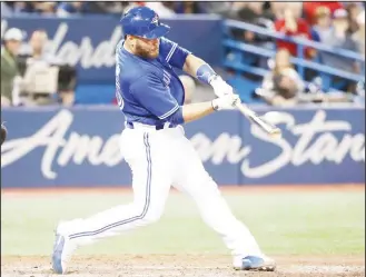  ?? (AFP) ?? Russell Martin #55 of the Toronto Blue Jays hits a two-run home run in the seventh inning during MLB game action
against the Chicago White Sox at Rogers Centre on April 2, in Toronto, Canada.