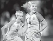  ?? Matthew Stockman Getty Images ?? JULIE ERTZ (8) of the U.S. and Megan Rapinoe are joyous after Ertz’s goal against New Zealand last year.