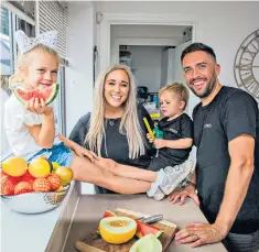  ??  ?? Diet decision: Karris Mcculloch and husband Scott are raising their children as vegans