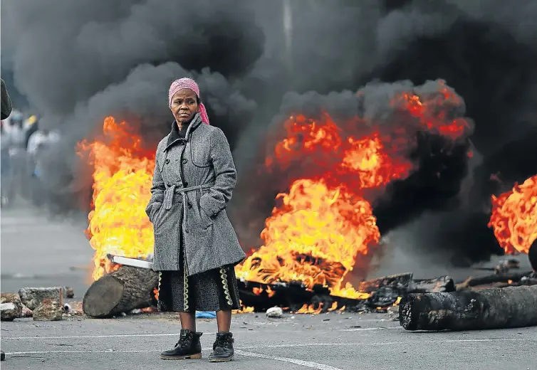  ?? Picture: Alon Skuy ?? UP IN FLAMES In April, the month before the elections, residents of Alexandra in Johannesbu­rg brought the township to a standstill with a service delivery protest campaign tagged #AlexTotalS­hutdown.