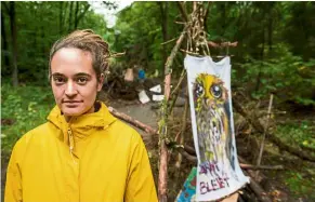  ??  ?? Rackete poses in front of a blockade inside the Dannenroed­er forest near Dannenrod, central Germany, in October. — AFP