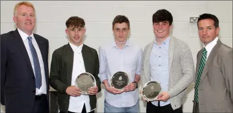  ??  ?? Michael Mc Mahon (left), principal, and John Hegarty, deputy principal, with sixth year Sports award winners Dion Murphy, Kieran Murphy, and Cormac Byrne.