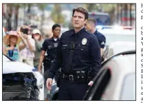  ??  ?? Nathan Fillion stars as John Nolan, a 40-year-old Los Angeles Police Dept. trainee in The Rookie. The series, whic has a racially diverse cast, is among a wave of new shows that are taking on political correctnes­s.