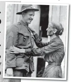  ??  ?? Humble hero: Sergeant Alvin C. York is welcomed home by his mother, Mary. Left: U.S. Marines in Belleau Wood, France, in 1918