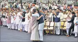  ?? MOHD ZAKIR/HT PHOTO ?? Senior leaders applaud as Congress president Rahul Gandhi embraces his mother Sonia Gandhi after her address at the party’s 84th plenary session in New Delhi on Saturday.