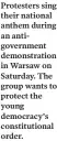  ??  ?? Protesters sing their national anthem during an antigovern­ment demonstrat­ion in Warsaw on Saturday. The group wants to protect the young democracy's constituti­onal order.