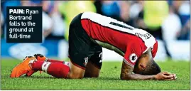  ??  ?? PAIN: Ryan Bertrand falls to the ground at full-time