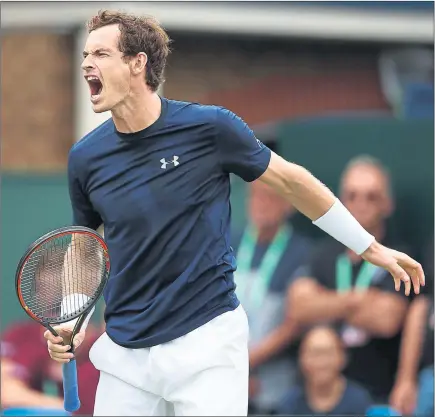  ??  ?? ROARING ON: Andy Murray turned Team GB’s fortunes after James Ward was downed by Gilles Simon