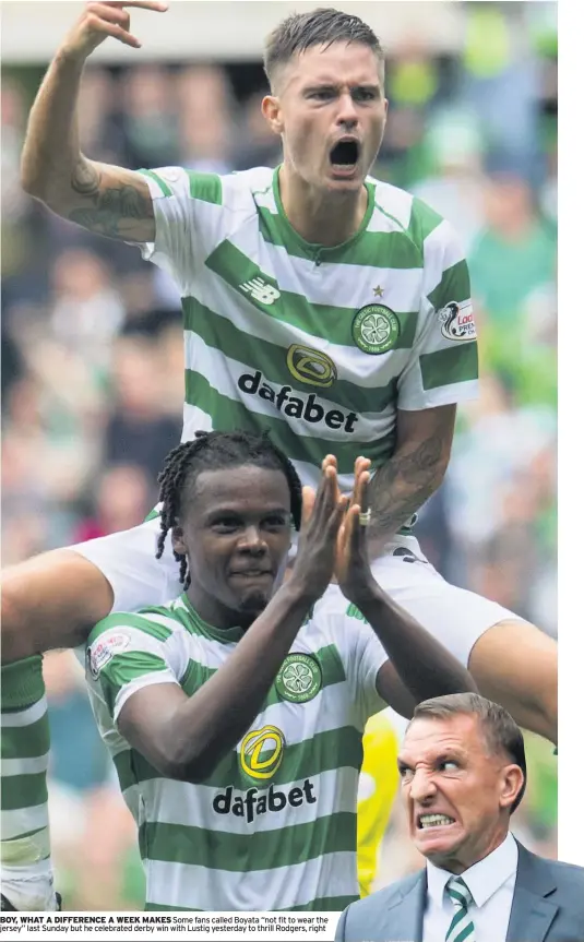  ??  ?? BOY, WHAT A DIFFERENCE A WEEK MAKES Some fans called Boyata “not fit to wear the jersey” last Sunday but he celebrated derby win with Lustig yesterday to thrill Rodgers, right