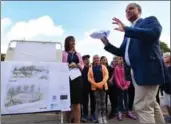  ??  ?? Coun. Matthew Green speaks at Memorial City Elementary School to announce playground enhancemen­ts through a partnershi­p between the school board and the city. NATALIE PADDON