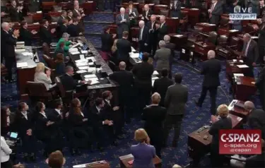  ?? C-SPAN2 VIA AP ?? In this image from video provided by C-SPAN2, Sen. John McCain, R-Ariz. is applauded as he arrives of the floor of the Senate on Capitol Hill in Washington, Tuesday.