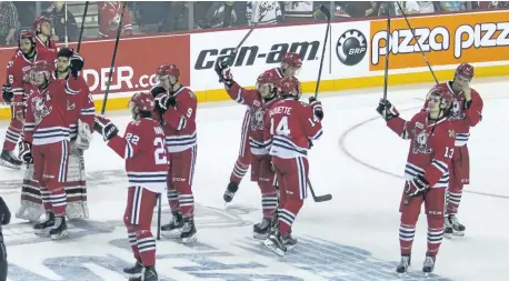  ?? PHOTOS BY BOB TYMCZYSZYN/POSTMEDIA NETWORK ?? The Niagara IceDogs, seen here in this file photo saluting the fans following their final home game last season, are moving their primary home nights to Friday.