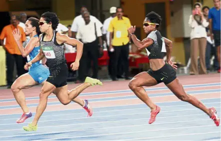  ??  ?? She’s too fast: Johor’s Siti Fatimah Mohamad (second from left) powering her way to the finish line ahead of Terengganu’s S. Komalam Shally (right) and the Philippine­s’ Eloiza Luzon in the women’s 100m final at the National Stadium in Bukit Jalil last...