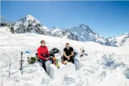  ??  ?? Lunch-time atop the glacier dome