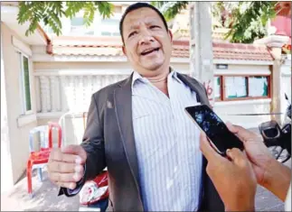  ?? PHA LINA ?? CPP spokesman Chhim Phal Virun speaks to reporters after being questioned by the Phnom Penh Municipal Court in relation to former opposition leader Kem Sokha’s ‘treason’ case.