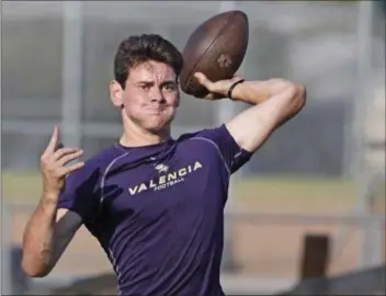  ?? Katharine Lotze /The Signal ?? Valencia senior quarterbac­k Connor Downs has thrown 25 touchdowns to four intercepti­ons in his first year as the starter. The Vikings play at Norco on Friday in the second-round of CIF-Southern Section Division 2 tournament.