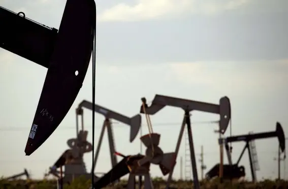  ?? Charlie Riedel, Associated Press file ?? Pumpjacks work in a field near Lovington, N.M., in 2015. An Indigenous leader from New Mexico and former U.S. Interior Secretary Bruce Babbitt called on the federal government Tuesday to overhaul its oil and gas leasing program to ensure the protection of cultural resources.