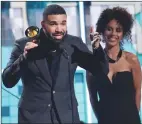  ?? Associated Press photo ?? Drake accepts the award for best rap song for “God’s Plan” at the 61st annual Grammy Awards on Sunday in Los Angeles.