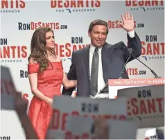  ?? PHELAN M. EBENHACK/AP ?? Republican gubernator­ial candidate Ron DeSantis and his wife, Casey, celebrate after he won his party’s primary Tuesday. Comments about the race got him in trouble, but he says he didn’t intend “to take a jab at anyone for ethnic or racial reasons.”