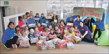  ?? 15_T46_Christmas box appeal_ 01 ?? Children and staff of Oban’s 1st Steps Day Nursery filled more than 40 shoeboxes with essential and luxury items to send to people in need this Christmas, all gathered in the nursery’s new extension.
