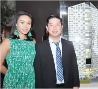  ??  ?? DoubleDrag­on president Ferdinand Sia (right) with chief investment officer Hannah Yulo at the grand launch of DoubleDrag­on’s Hotel 101-Fort.