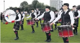  ??  ?? Champs North Lanarkshir­e’s Schools’pipe Band