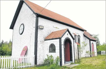  ?? SHARON MONTGOMERY-DUPE/CAPE BRETON POST ?? Christ Church in South Head is seen in this 2005 file photo. The 172-year-old wooden building, which some people say is haunted, could be recognized by the Cape Breton Regional Municipali­ty as a heritage property.