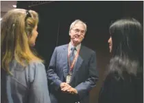  ??  ?? Former Alabama Gov. Don Siegelman, center, talks with audience members before a screening of the documentar­y “Atticus v. The Architect.”